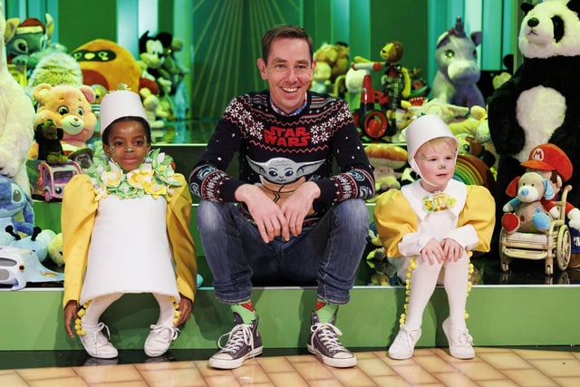 Ryan Tubridy is pictured with performers Deborah  Addeji (7) from Navan and Louis Hanna (5) from Artane as This Year’s Toy Show Theme is revealed as THE WIZARD OF OZ. Picture Andres Poveda