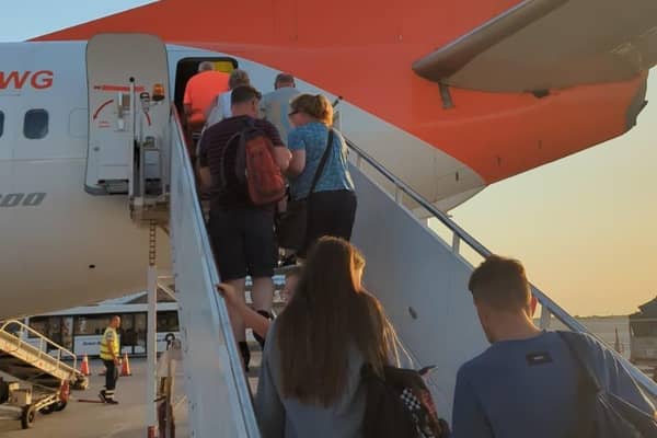 Boarding the flight from Rhodes to Belfast that had been delayed for nearly 46 hours. Photo sent by Kirsty Creese