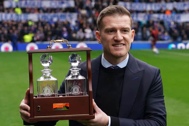 Steven Davis applauds the Rangers fans ahead of the cinch Premiership match at Ibrox against Motherwell. Davis, a former Northern Ireland captain who confirmed his retirement from the game in January, spent two spells as a Rangers player plus held the caretaker manager's role. A special presentation of two glass decanters was made to the 39-year-old ahead of kick-off to honour the Rangers Hall of Fame inductee. (Photo by Andrew Milligan/PA Wire)