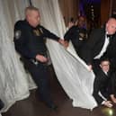 Members of Enoch Burke's family are ejected from the Ireland Funds 33th National Gala dinner at the National Building Museum in Washington DC on Friday, March 14