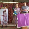 Dr Mawhinney and his wife Karen bring greetings from PCI to the  PCEA church in Tuum, in northern central Kenya. Also pictured is Kasoni, who translated as he preached
