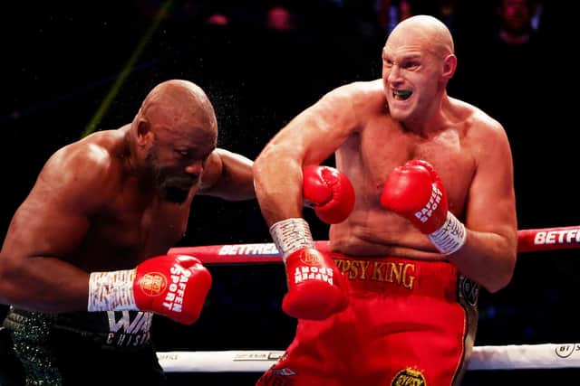 Tyson Fury (R) comprehensively defeated Derek Chisora (L) during their WBC World Heavyweight Title fight at Tottenham Hotspur Stadium on Saturday in London. (Photo by Warren Little/Getty Images)