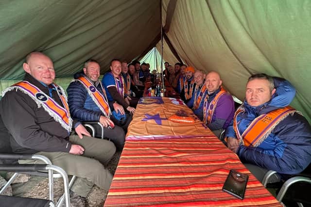 The Hiking for Little Heroes group holding an Orange lodge meeting at Barafu Camp on Mt Kilimanjaro.