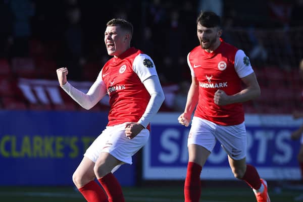 Larne’s Aaron Donnelly celebrates his goal in victory by 8-1 at Inver Park over Cliftonville to send the defending champions back on top of the Sports Direct Premiership table. (Photo by Arthur Allison/Pacemaker Press)