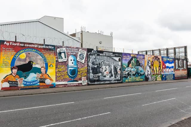 A pioneering travel company, set up by a father on his paternity leave, is launching its inaugural tour promising to uncover a side of Belfast rarely found in tourist books. Pictured are the famous political murals along The Falls Road in Belfast, Northern Ireland.  There have been nearly 2,000 murals documented in Northern Ireland since the 1970s, mostly depicting the region's past and present political and religious divisions, or other aspects of Irish history or culture