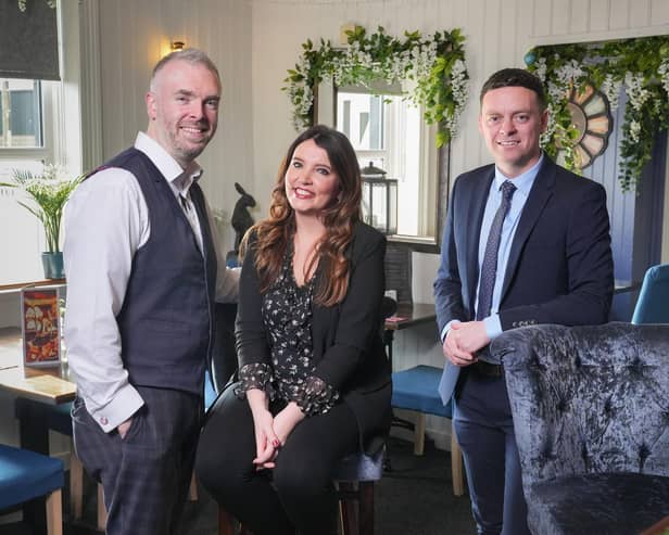 Entrepreneurs Caorlan and Ciara McAllister have taken ownership of The Halfway House in Banbridge after acquiring the licence and trading premises for the century-old pub and restaurant as part of a six-figure investment supported by Ulster Bank. Pictured are Caorlan and Ciara McAllister with Ulster Bank business development manager Lee White