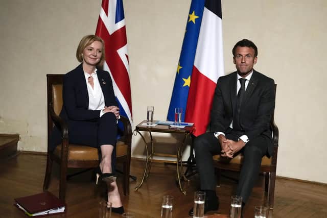 Prime Minister Liz Truss, talks with France's President Emmanuel Macron during a bilateral meeting at the European Political Community (EPC) summit on Thursday, at Prague Castle in the Czech Republic. Picture date: Thursday October 6, 2022