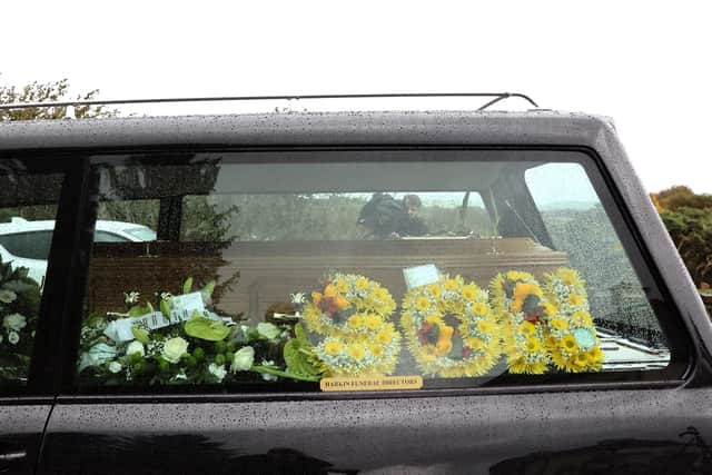 The coffin of Martin McGill in a hearse outside St Michael's Church, Creeslough, following his funeral.  Wire