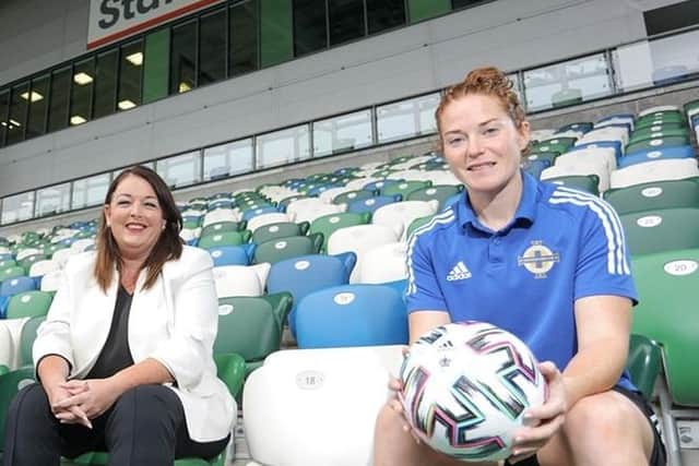 Northern Ireland recruitment agency, Staffline is to host job fair at The National Football Stadium at Windsor Park this month. Pictured are Staffline CEO Tina McKenzie MBE with captain of the Northern Ireland women’s national football team Marissa Callaghan in the Staffline family stand, National Football Stadium Windsor Park