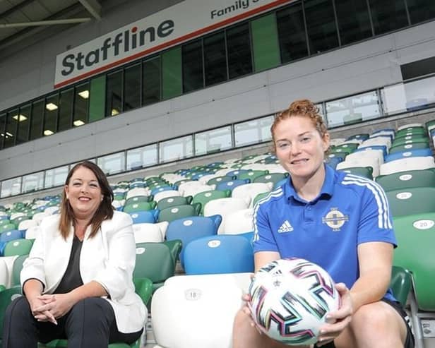 Northern Ireland recruitment agency, Staffline is to host job fair at The National Football Stadium at Windsor Park this month. Pictured are Staffline CEO Tina McKenzie MBE with captain of the Northern Ireland women’s national football team Marissa Callaghan in the Staffline family stand, National Football Stadium Windsor Park