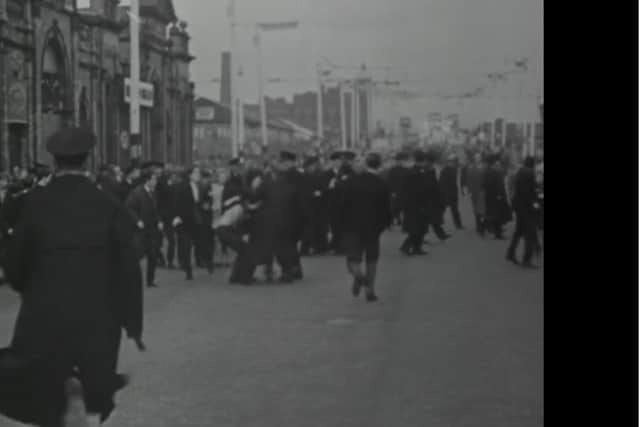 Screengrab from the first part of the April 2023 BBC documentary series The House of Paisley. This scene shows trouble in East Bridge Street, on the edge of the Markets, looking east towards the Albert Bridge, over the River Lagan. It seems to have been filmed after Rev Paisley marched past