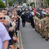 A previous Armed Forces Day parade in Banbridge - Sinn Fein has queried the cost of next year's event in Newtownabbey