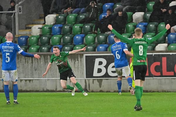 Glentoran's Bobby Burns celebrates his late equaliser in the 1-1 draw against Linfield at Windsor Park in Belfast.