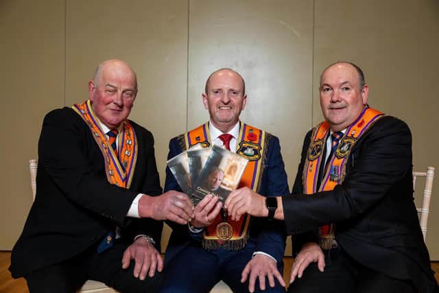 The Grand Master of the Grand Orange Lodge of Ireland, Most Wor. Bro.  Edward Stevenson;  Wor. Bro. Rev’d Rodney Beacom; and County Fermanagh County Grand Master, Rt Wor. Bro. Mervyn Byres pictured at the ‘Crossing the Line’ DVD launch in Fivemiletown. (Picture by Graham Baalham-Curry)