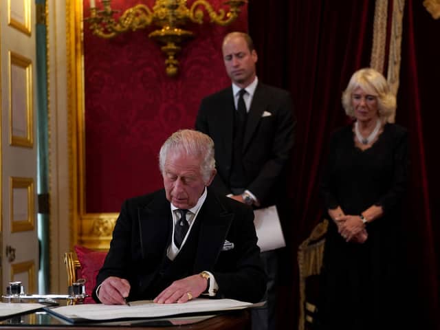 King Charles III signs an oath to uphold the security of the Church in Scotland during the Accession Council at St James's Palace, London, where King Charles III is formally proclaimed monarch. Charles automatically became King on the death of his mother, but the Accession Council, attended by Privy Councillors, confirms his role. Photo credit: Victoria Jones/PA Wire