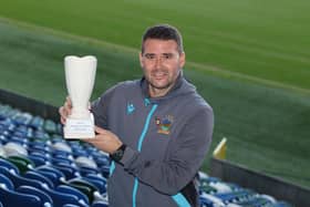 Linfield boss David Healy receives his Manager of the Month prize for October