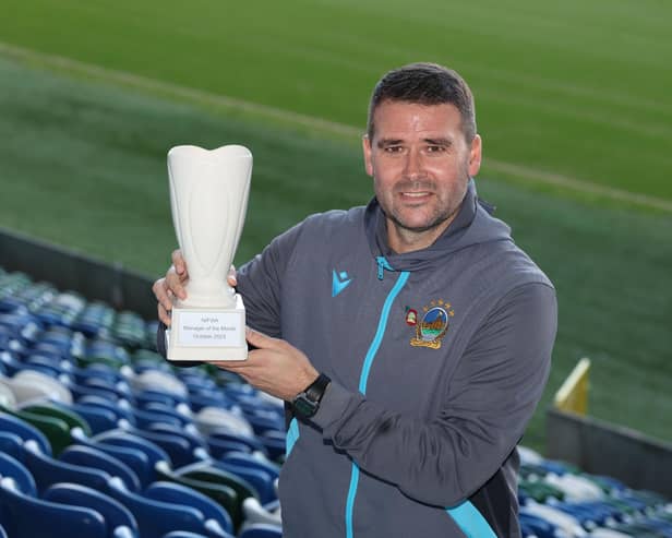 Linfield boss David Healy receives his Manager of the Month prize for October