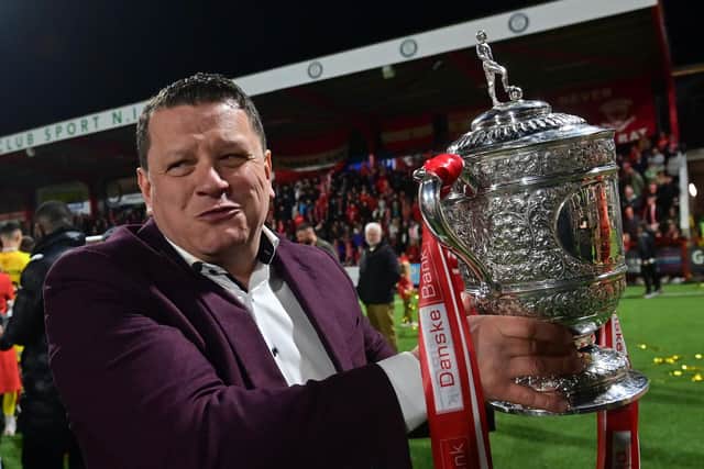 Larne owner Kenny Bruce celebrates with the Gibson Cup. PIC: Colm Lenaghan/Pacemaker Press