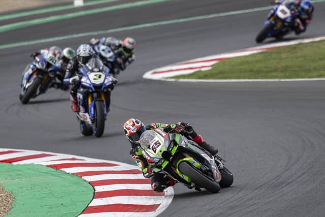 Jonathan Rea finished 24th in Saturday's opening race at Magny-Cours in France after crashing out of second place before re-joining the race.