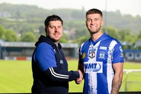 Newry City manager Gary Boyle with new signing Adam Salley. Photo credit: Brendan Monaghan Photography