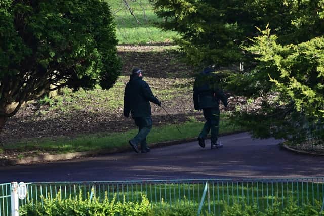 Police carry out searches after A man was stabbed in Belfast's Botanic Gardens on Monday afternoon.