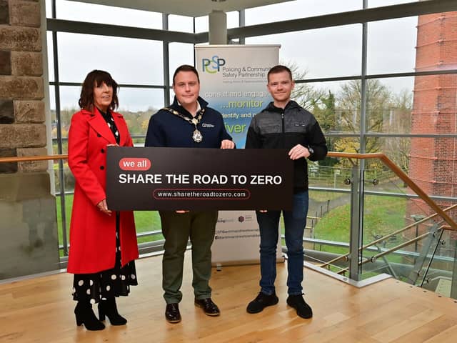 Over 450 companies and organisations have signed a pledge to stop all road deaths in Northern Ireland. Pictured are Mayor of Antrim and Newtownabbey, councillor Mark Cooper, councillor Matthew Brady, chairperson of Antrim and Newtownabbey Policing and Community Safety Partnership (PCSP) and Lynda Hurley, head of road safety promotion at the Department for Infrastructure