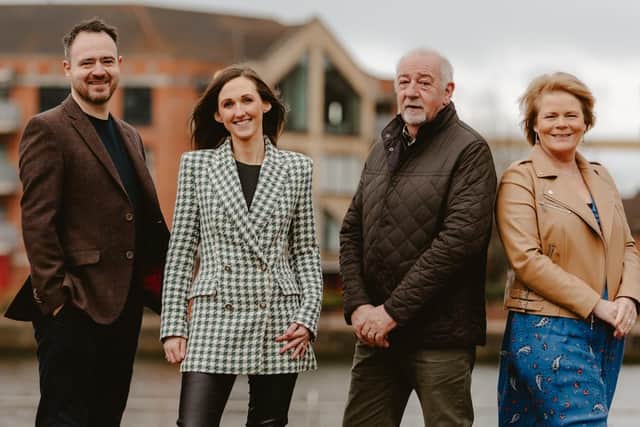 Lisburn's NI Property Girl, established by property expert Eimear Gourley in 2020, has announced substantial company growth and expansion. Pictured is founder Eimear Gourley with some of the team