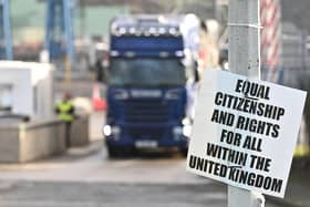 A protest sign against EU trade restrictions on goods coming into NI from GB last year at the port of Larne. The Windsor Framework did not correct an “underlying mistake” in the Northern Ireland Protocol, a Westminster committee has heard.
Photo Colm Lenaghan/Pacemaker Press