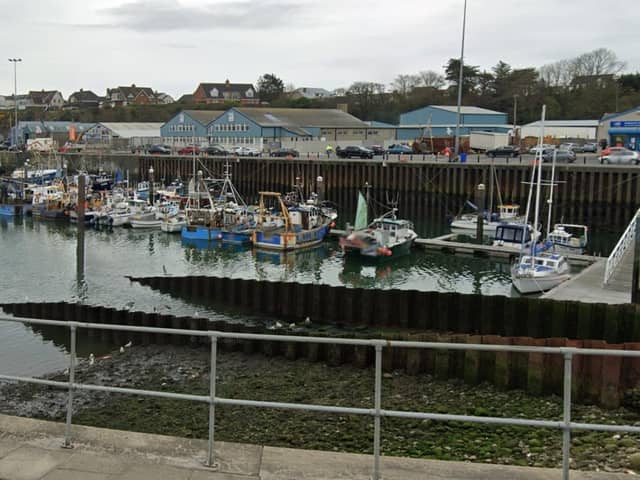 Kilkeel harbour in calmer times. The River Aughrim, seen on the right flowing into the habour, ran with such violence on Tuesday night that it sank one vessel and seriously damaged others. Photo: Google maps.