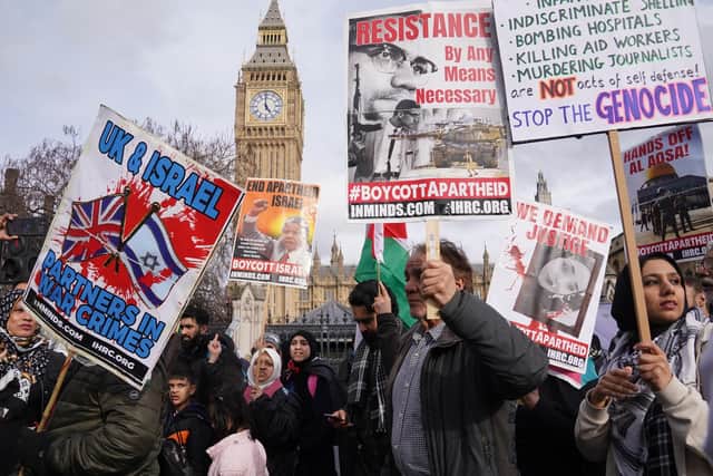 Demonstrators march through London at a rally organised by the Islamic Human Rights Commission calling for a boycott of Israel and an end to Israeli actions
