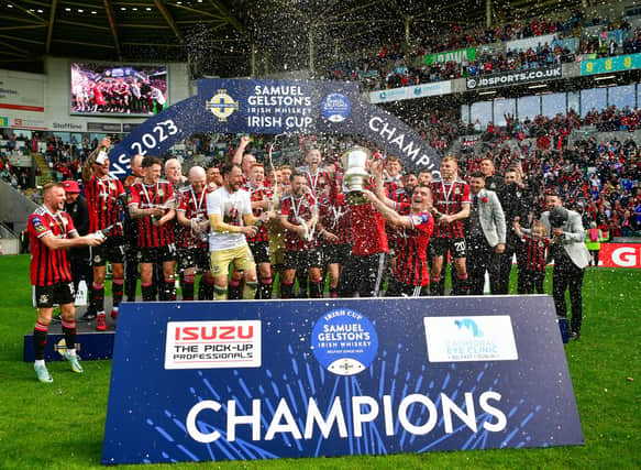 Crusaders lift the Samuel Gelston’s Whiskey Irish Cup after a 4-0 win over Ballymena United at Windsor Park last Sunday