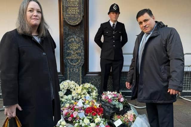 Susanne Dodd, daughter of Inspector Stephen Dodd, killed in the Harrods bomb, and Docklands Victims Association President Jonathan Ganesh laying floral tributes at the memorial plaque outside Harrods Department Store, Hans Crescent, Knightsbridge, London SW1 on Sunday December 17 2023, 40 years after the IRA blast in which six people were killed