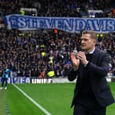 Steven Davis applauds the Rangers fans ahead of the cinch Premiership match at Ibrox against Motherwell. Davis, a former Northern Ireland captain who confirmed his retirement from the game in January, spent two spells as a Rangers player plus held the caretaker manager's role. A special presentation was made to the 39-year-old ahead of kick-off to honour the Rangers Hall of Fame inductee. (Photo by Andrew Milligan/PA Wire)