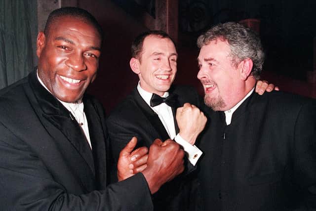 "Its a Knock Out" or it soon will be for UTV's Gerry Kelly as he gets cornered by former world boxing champs Barry McGuigan and Frank Bruno during Friday nights Kelly show in Belfast in 1998. Photo:Pacemaker