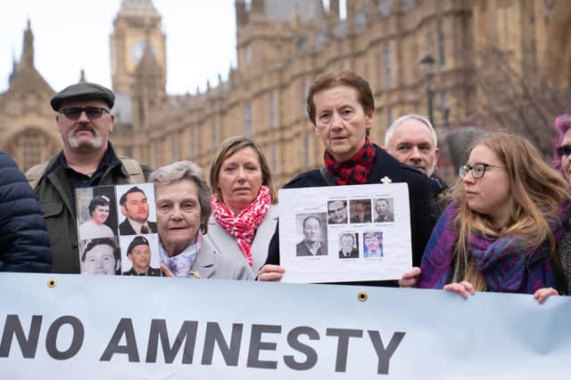 Members of the victims group South East Fermanagh Foundation (SEFF) demonstrate outside the Houses Of Parliament in Westminster.