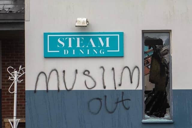 The police have said an arson attack on a licenced premises is being investigated as a racially-motivated hate crime.