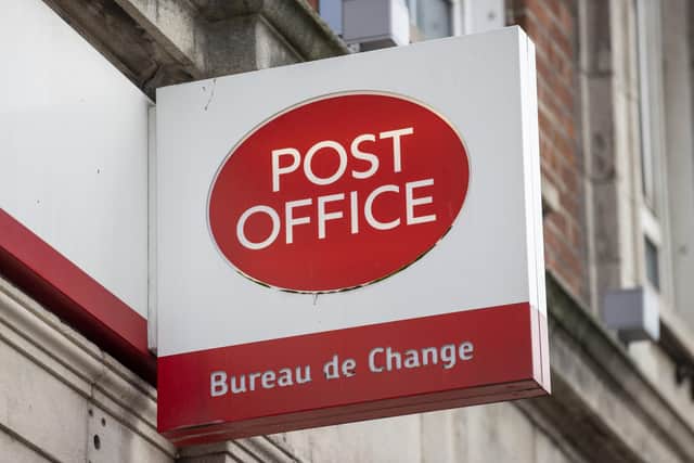 A sign for the Post Office Ltd and Bureau de Change at the Belfast City branch