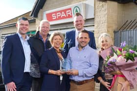 Spar Gortmerron Parade in Dungannon marks 20 years community service. Pictured are store owners James Henderson and Karan Boe with their partners Barbara and Alan, alongside the store’s business development manager, Daren Esler and Justin Hayes, regional sales manager at Henderson Group
