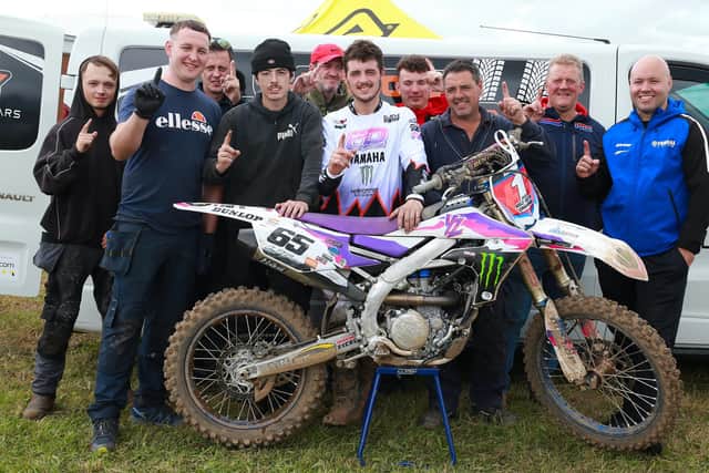 MX2 Ulster champion James Mackrell with his team at Saul. Picture: Maurice Montgomery