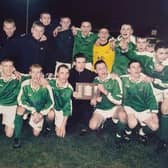 Northern Ireland under 15s celebrate a first-ever Victory Shield triumph back in 2000 with a squad including Steven Davis (front row, third left) and Paul Carvill (front row, right). (Photo courtesy of NI Schools' FA)