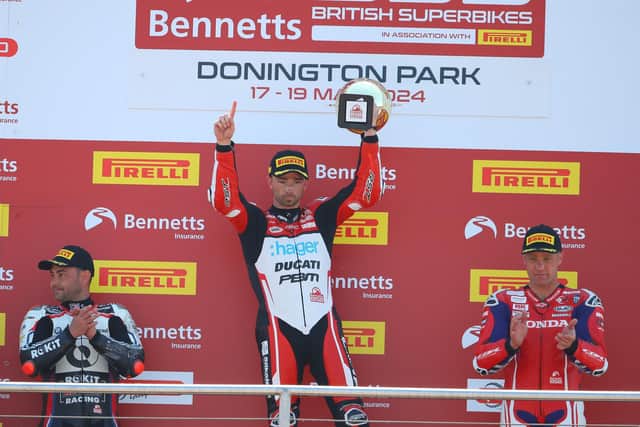 Glenn Irwin celebrates his victory in the British Superbike Championship at Donington Park in Leicestershire