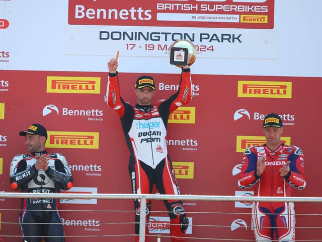 Glenn Irwin celebrates his victory in the British Superbike Championship at Donington Park in Leicestershire
