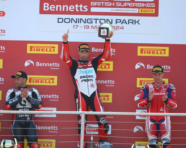 Glenn Irwin celebrates his victory in the British Superbike Championship at Donington Park in Leicestershire