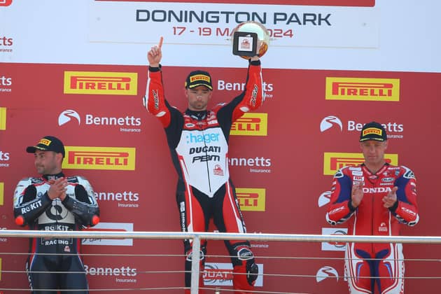 Glenn Irwin celebrates his victory in the British Superbike Championship at Donington Park in Leicestershire