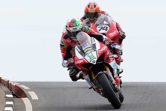 Glenn Irwin (Hager PBM Ducati) edged out Davey Todd (Milwaukee BMW) to win the opening Superbike race at the North West 200