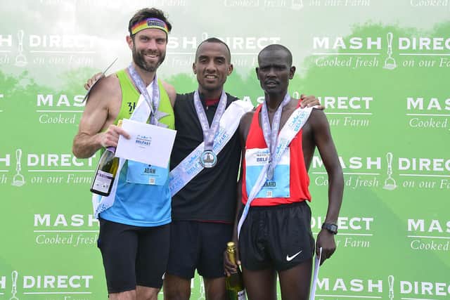 On the Belfast Marathon podium from left are runner-up Adam Bowden, winner Mohamed Oumaarir and third-placed finisher Bernard Rotich
The Moroccan crossed the line at Ormeau Park in 2:22:56, coming in just ahead of Wales’ Adam Bowden who finished in 2:23:26. Pre race favourite Bernard Rotich came in in 2:26:02 after being left behind by Oumaarir shortly before the Lagan Towpath at Ormeau.
Picture By: Arthur Allison/ Pacemaker Press.