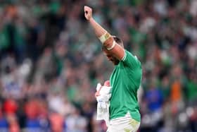 Ireland's Stuart McCloskey celebrates victory with his new-born son Kasper after making his World Cup debut in Saturday's dominant victory over Scotland in Paris