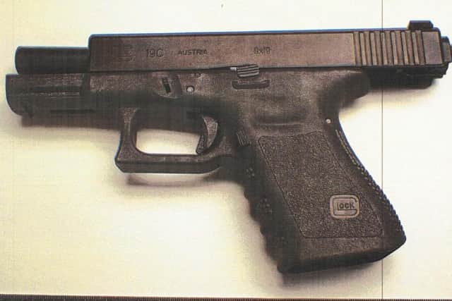PSNI image - Glock pistol found in South Armagh arms cache