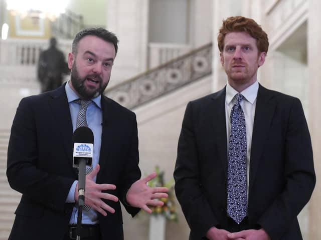 SDLP leader Colum Eastwood (left) and Matthew O'Toole speak during a press conference at Parliament Buildings, Stormont, Belfast, on Monday