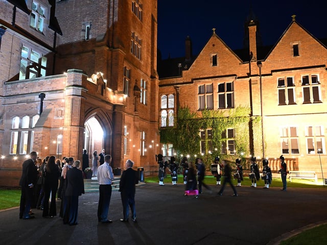 The Campbell College Pipe Band perform as guests arrive at the OC Ball, held at Campbell College, organised by the Old Campbellian Society.